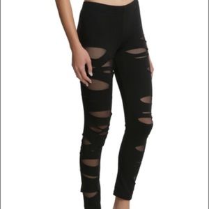 Destructed fishnet leggings